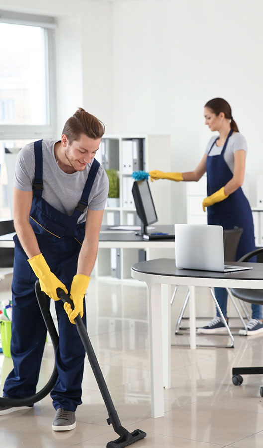 Male and female cleaners providing exceptional clean to offices.